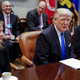 Donald Trump meets with auto industry leaders. Image via Getty.